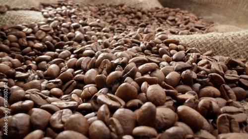 Wallpaper Mural Brown roasted coffee beans. Pile of aromatic coffee beans. Rich harvest. Slider dolly shot. Macro shot. Caffeine industry. Freshly roasted coffee beans. Cinematic. 4K, UHD Torontodigital.ca