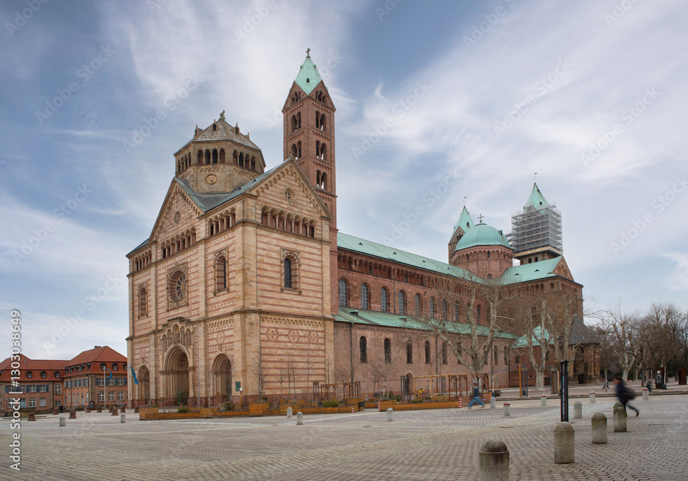 Fototapeta premium Speyer Cathedral on a sunny day, showcasing its Romanesque architecture. Various views highlight the historic towers, sandstone facade, and intricate details of this UNESCO World Heritage 