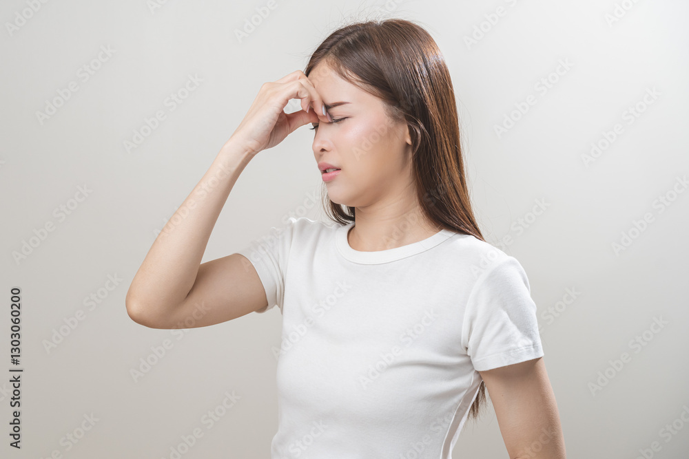 Dizzy asian young woman, girl headache or migraine pain suffering from vertigo or sick, holding head with hand, health problem of brain or inner ear not balance, standing isolated on white background. Dizzy asian young woman, girl headache or migraine pain suffering from vertigo or sick, holding head with hand, health problem of brain or inner ear not balance, standing isolated on white background.