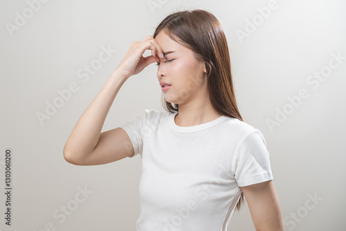 Wallpaper Mural Dizzy asian young woman, girl headache or migraine pain suffering from vertigo or sick, holding head with hand, health problem of brain or inner ear not balance, standing isolated on white background. Torontodigital.ca