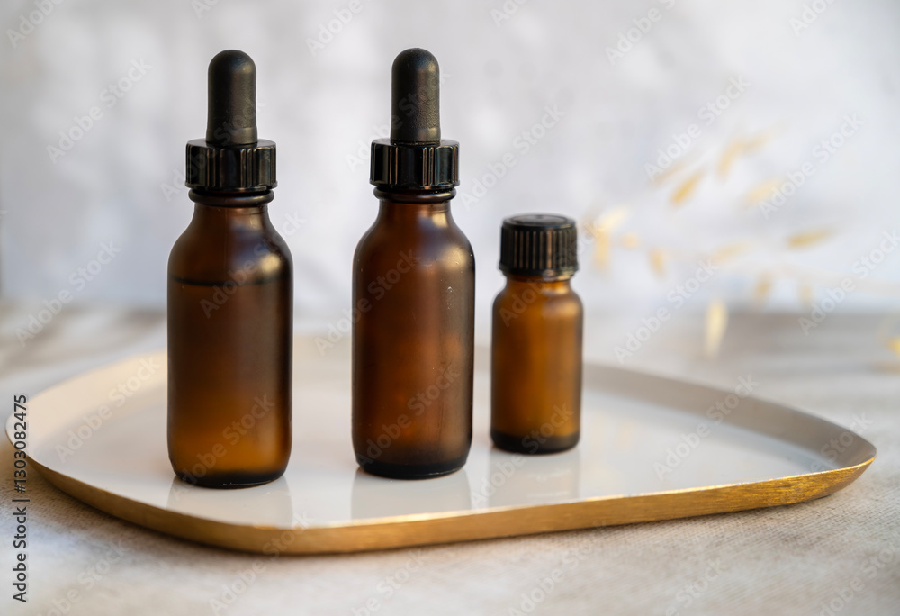 Amber Glass bottles with face serum Amber Glass bottles with face serum
