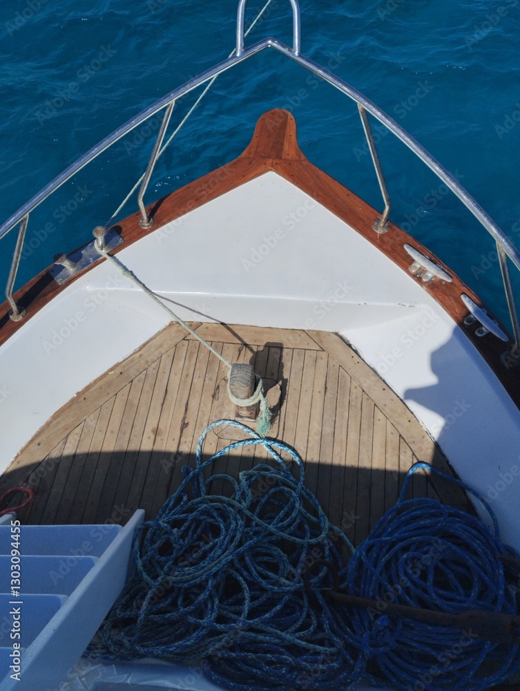 The bow of a boat, yacht, in the azure sea