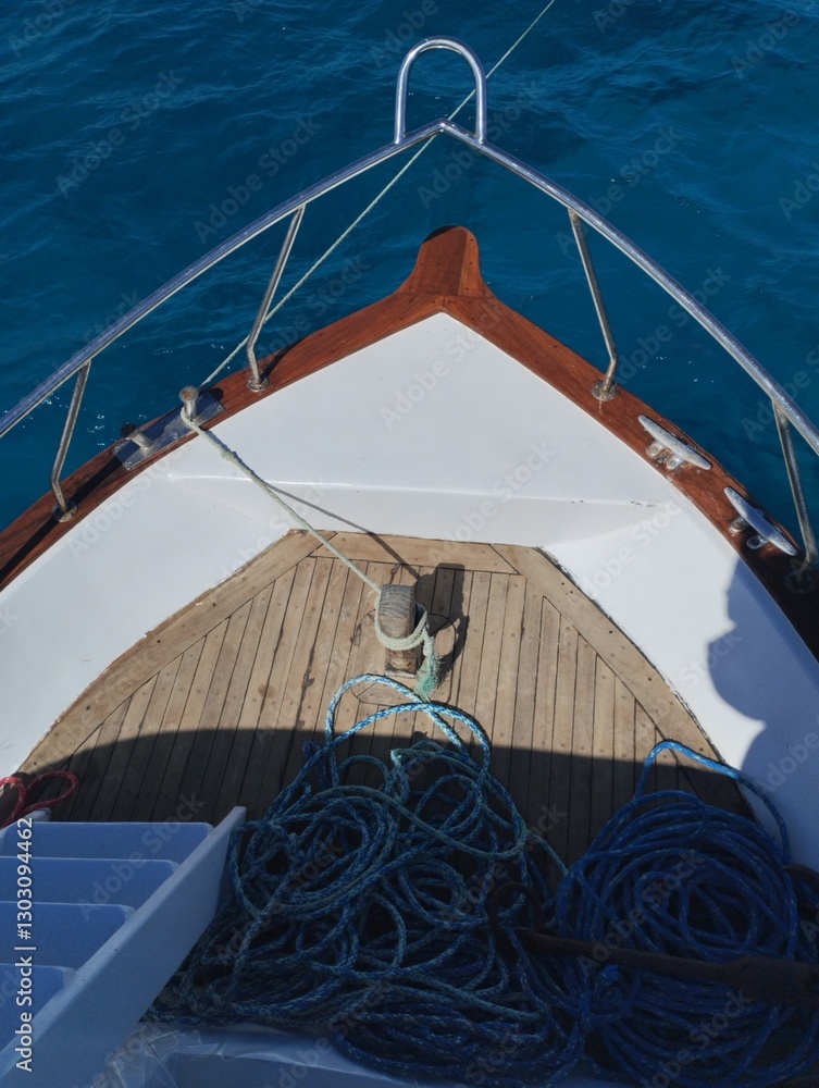 The bow of a boat, yacht, in the azure sea
