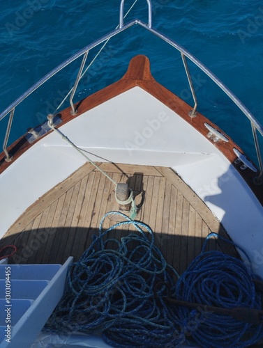 The bow of a boat, yacht, in the azure sea