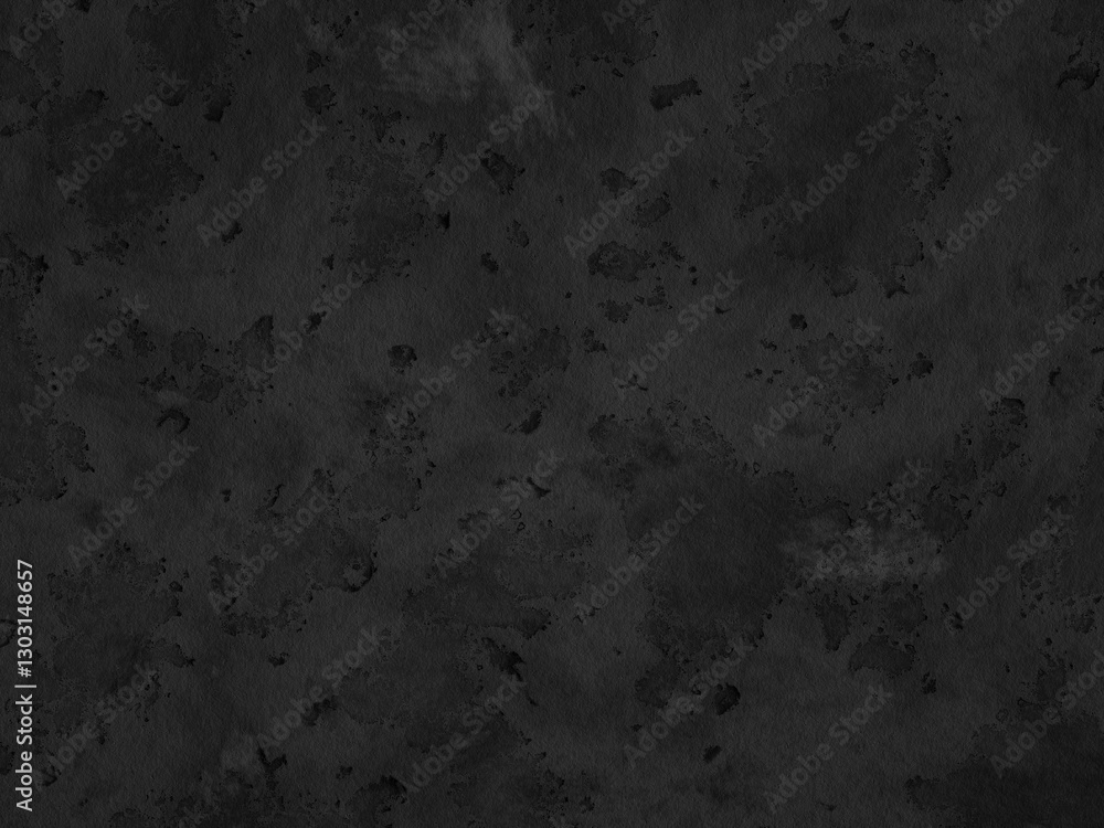 Obraz premium A dark concrete surface showing signs of wear with scattered marks.