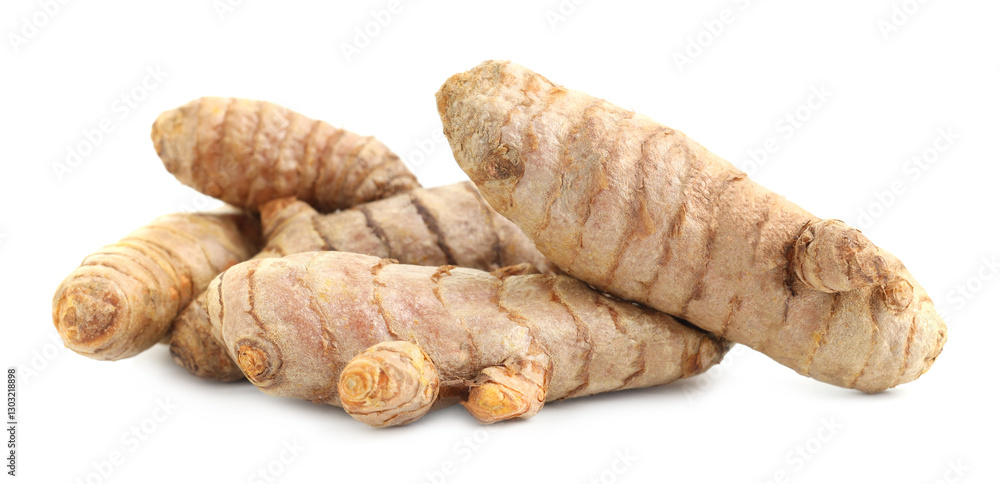 Pile of fresh turmeric roots isolated on white Pile of fresh turmeric roots isolated on white