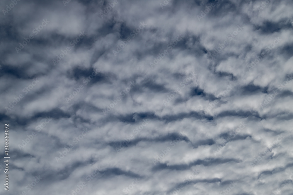Dramatic Layered Clouds Filling The Sky with a Moody Atmosphere