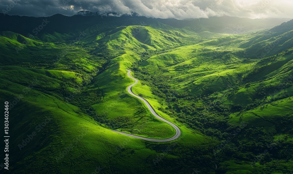 winding road winds through the green hills, creating an enchanting aerial view of nature's beauty winding road winds through the green hills, creating an enchanting aerial view of nature's beauty
