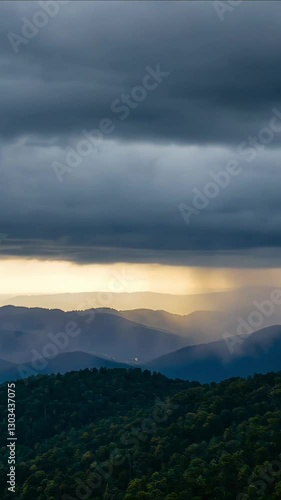 4K Time-Lapse of Clouds Rolling Over Green Hills and Mountains with Fog, Wind, and Rain
