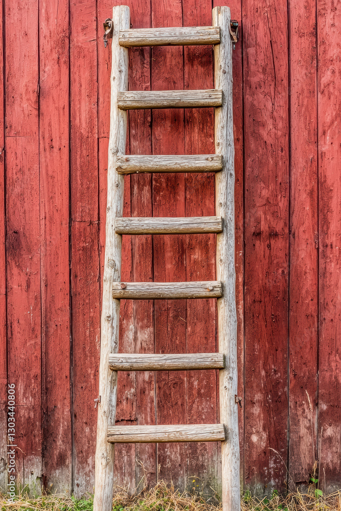 dusty wooden ladder leans against rustic red barn wall, showcasing its weathered texture and charm dusty wooden ladder leans against rustic red barn wall, showcasing its weathered texture and charm