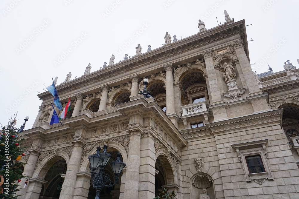 Festive Christmas decoration outside the historic facade of the landmark Budapest Opera House in Budapest, Hungary in winter Festive Christmas decoration outside the historic facade of the landmark Budapest Opera House in Budapest, Hungary in winter