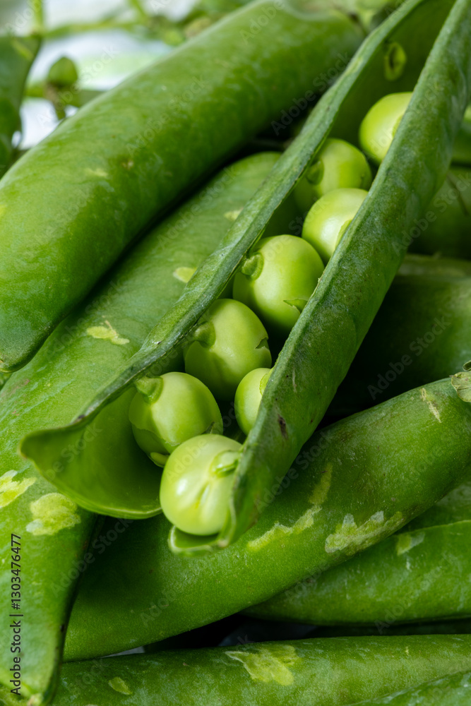 New harvest of fresh ripe green peas legumes New harvest of fresh ripe green peas legumes
