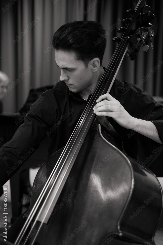 man playing a contrabass man playing a contrabass