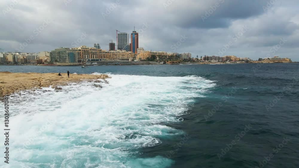 Rocky ocean coast Big waves with white foam on the shore Drone footage the move. Rocky ocean coast Big waves with white foam on the shore Drone footage the move.