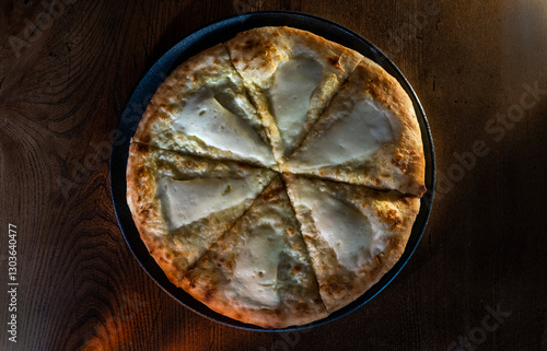 Khachapuri on a plate, traditional Caucasian dish