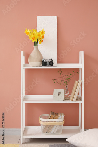 Modern white bookshelf with...