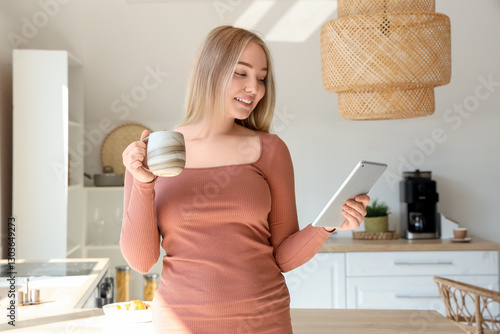 Young woman with cup of hot...