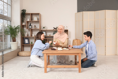 Happy Muslim mother and her...