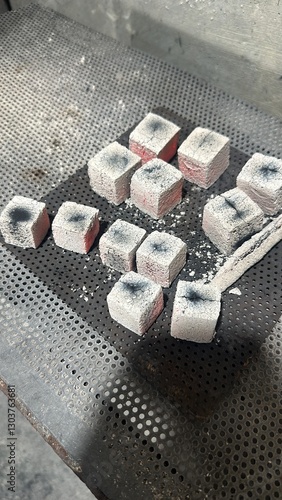 Fire burning from coconut charcoal briquette for business production	