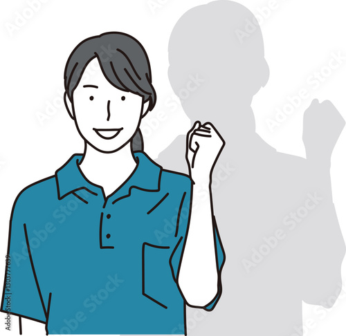 ガッツポーズをする女性の介護士