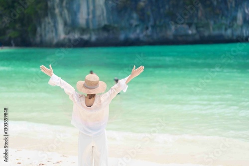 Woman tourist traveling and sightseeing in Krabi, Thailand. happy traveller enjoy on beach at koh Hong island. summer trip, destination, Southeast Asia Travel, vacation and holiday concept photo