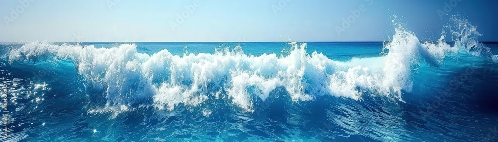 Fototapeta premium A bright blue ocean waves crashing against each other under a clear sky, showcasing the beauty and power of nature.