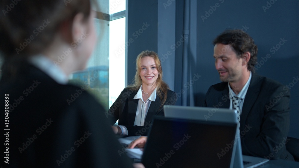 In the conference room, a group of businesspeople are discussing the follow-up meeting and the results of operations In the conference room, a group of businesspeople are discussing the follow-up meeting and the results of operations