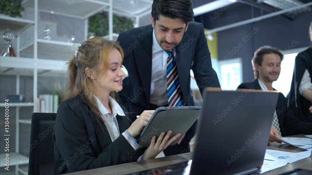 In the conference room, a group of businesspeople are discussing the follow-up meeting and the results of operations In the conference room, a group of businesspeople are discussing the follow-up meeting and the results of operations