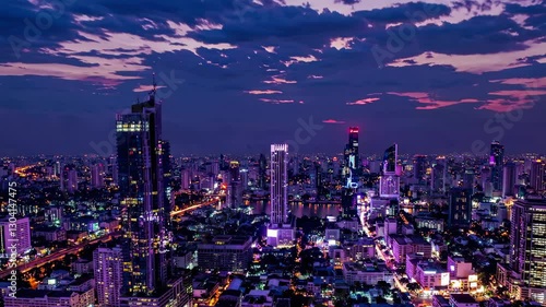 Wallpaper Mural Aerial video showcasing a bustling cityscape at dusk, highlighting vibrant lights and towering skyscrapers. Captured from a high-angle perspective. Torontodigital.ca