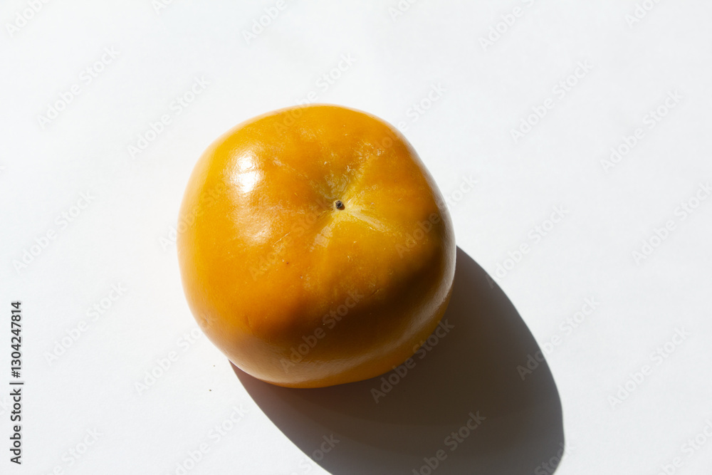 It is Persimmon lying on a white background
