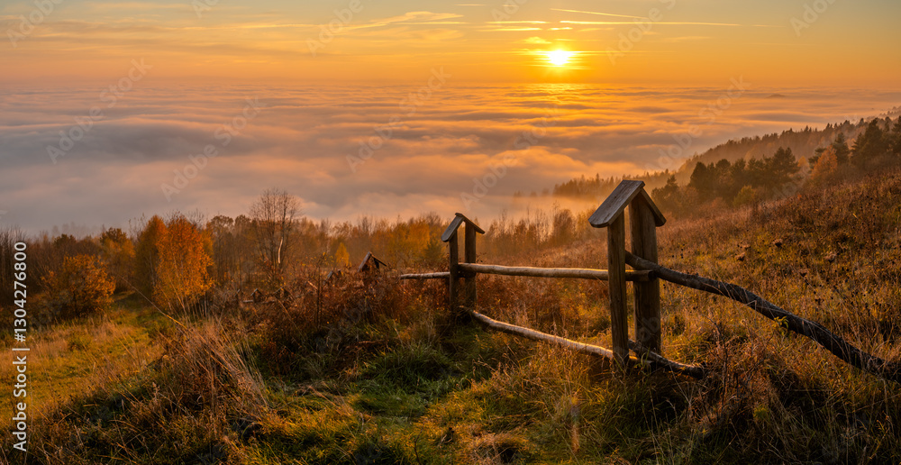 A magnificent autumn sunset over a mountain meadow near the city of Krosno, Poland