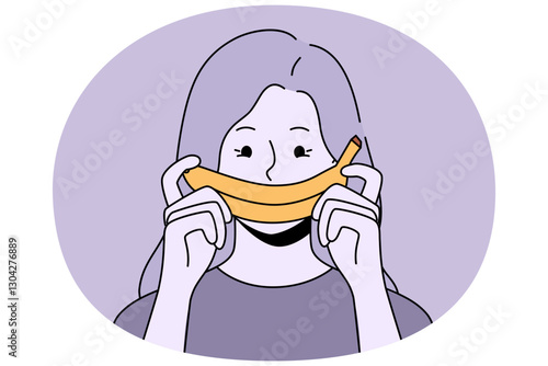 Woman with fake banana smile experiencing frustration and melancholy caused by problem in relationship with boyfriend. Girl holds tropical fruit, wanting to hide frustration associated with losing job
