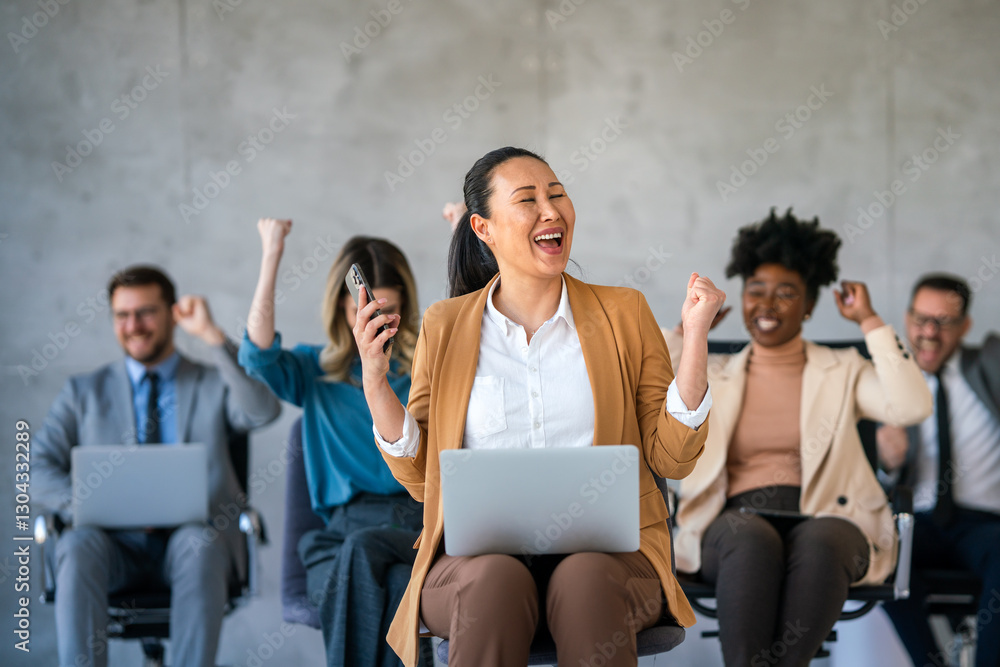Excited overjoyed diverse business people, team celebrate corporate victory together in office Excited overjoyed diverse business people, team celebrate corporate victory together in office