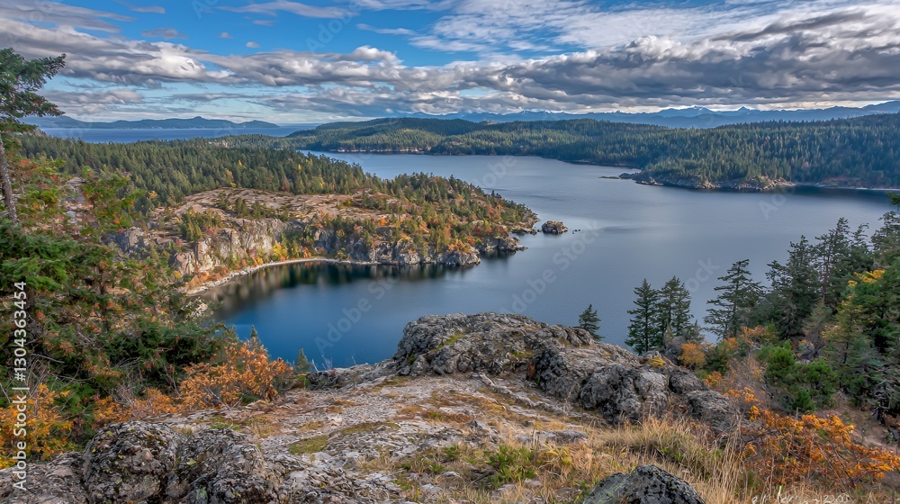 Naklejka premium Autumnal Coastal Landscape with Blue Bay and Green Hills