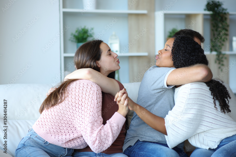 Lesbian lovers flirting while hugging her partners Lesbian lovers flirting while hugging her partners