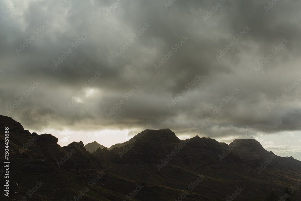 Dramatic Mountain Landscape Under Cloudy Sky Dramatic Mountain Landscape Under Cloudy Sky