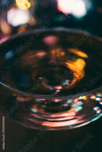 Obraz na płótnie Abstract multicolour background. New Year lights. Blurred colourful light on champagne glass. Rainbow flash in dark. Futuristic shiny background. Illuminated effect. Bright glowing. w salonie