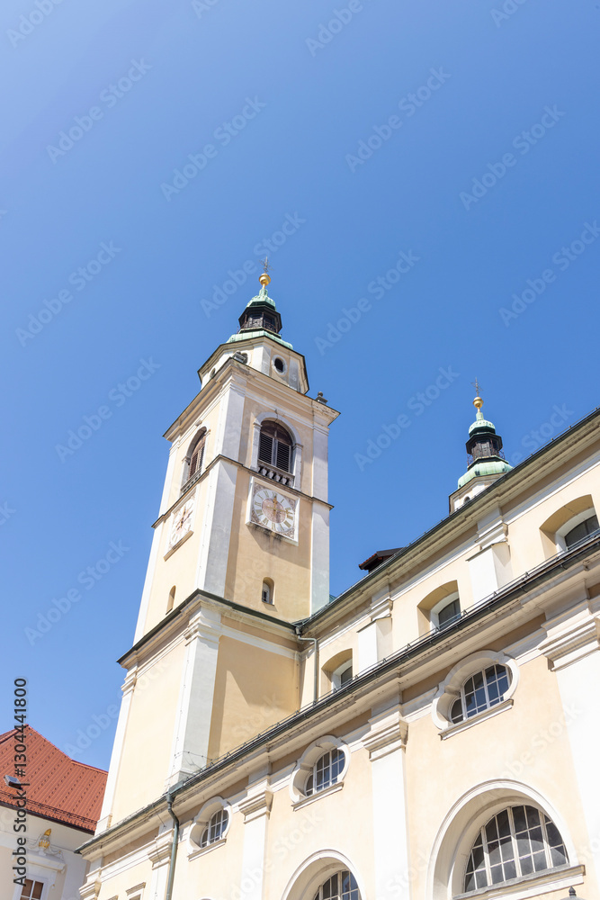 Saint Nicolas cathedral in Ljubljana in front of blue sky, capital city of Slovenia Saint Nicolas cathedral in Ljubljana in front of blue sky, capital city of Slovenia