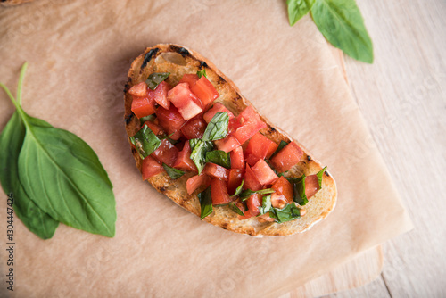 Bruschetta with tomatoes and basil prepared for breakfast