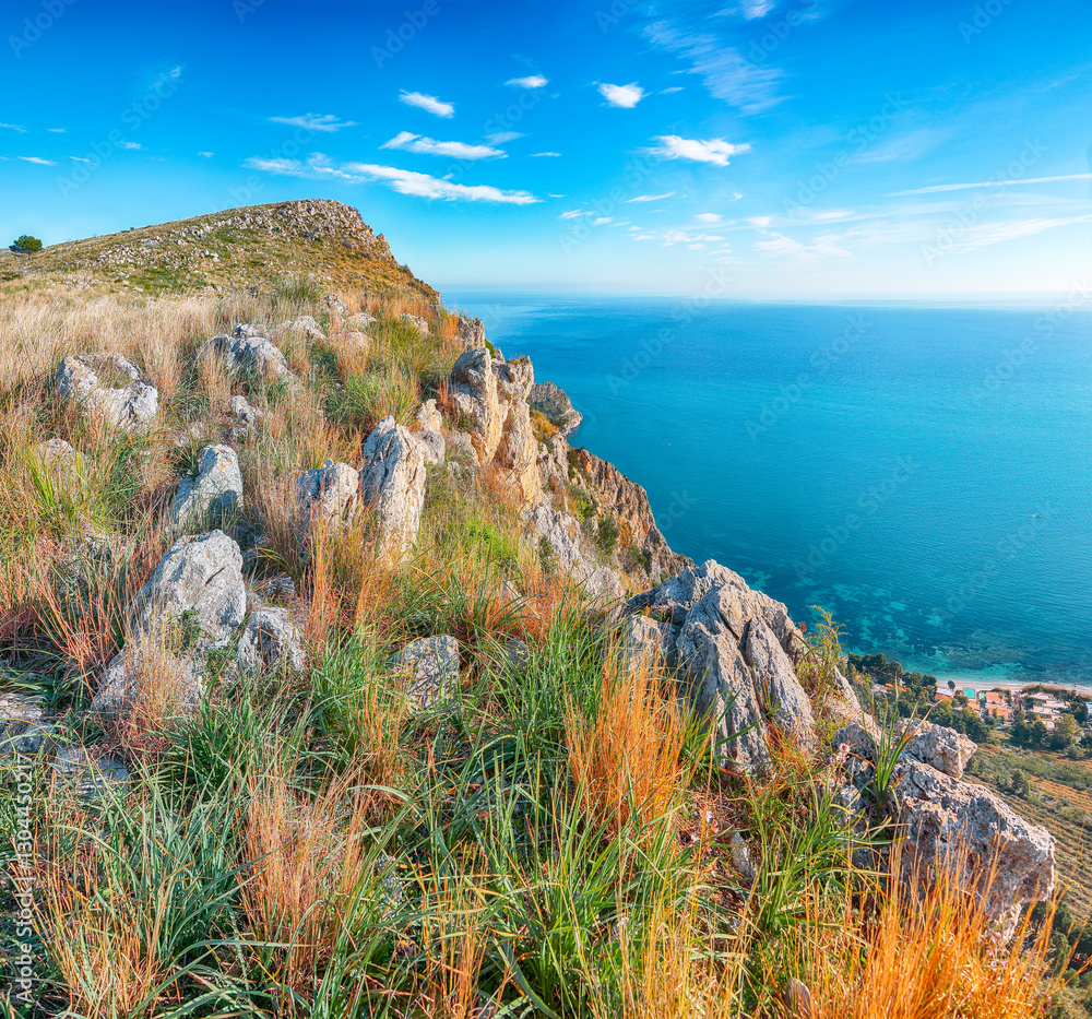 Spectacular view of Santa Flavia town with cape Zafferano and national park Orientata Pizzo Cane.
