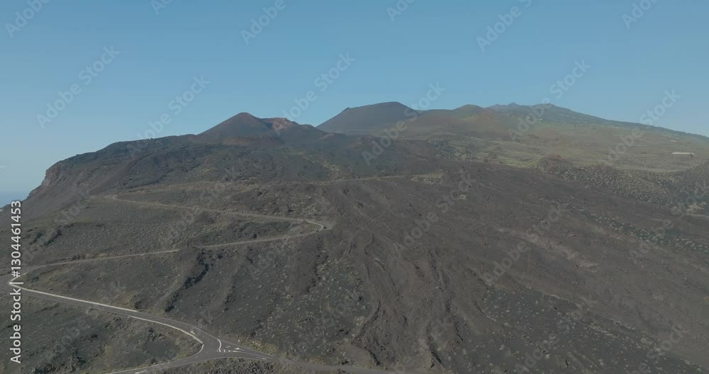 Road leading up to volcanic mountain range on La Palma island, aerial Road leading up to volcanic mountain range on La Palma island, aerial