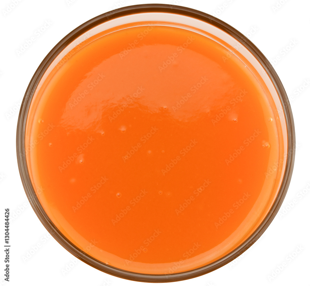 Glass of fresh carrot juice isolated on a transparent background. Completely in focus. Focus stacking. Top view. Glass of fresh carrot juice isolated on a transparent background. Completely in focus. Focus stacking. Top view.