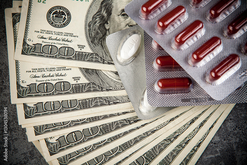 Obraz na płótnie Pills and capsules on the background of the dollar. The concept of expensive medicine. w salonie