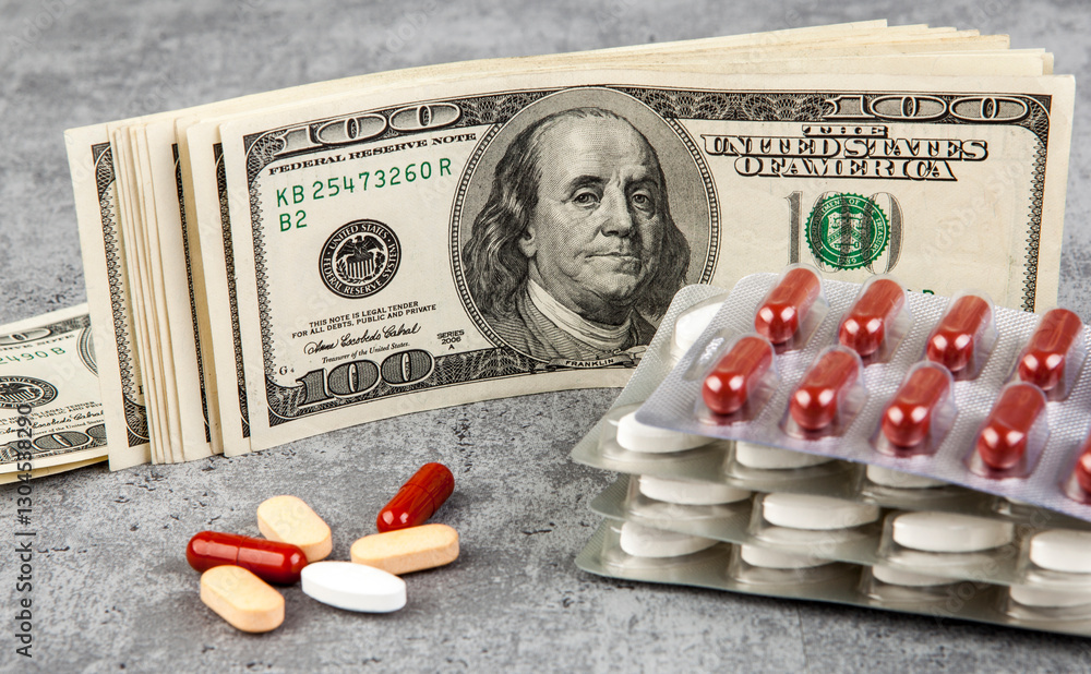 Pills and capsules on the background of the dollar. The concept of expensive medicine.