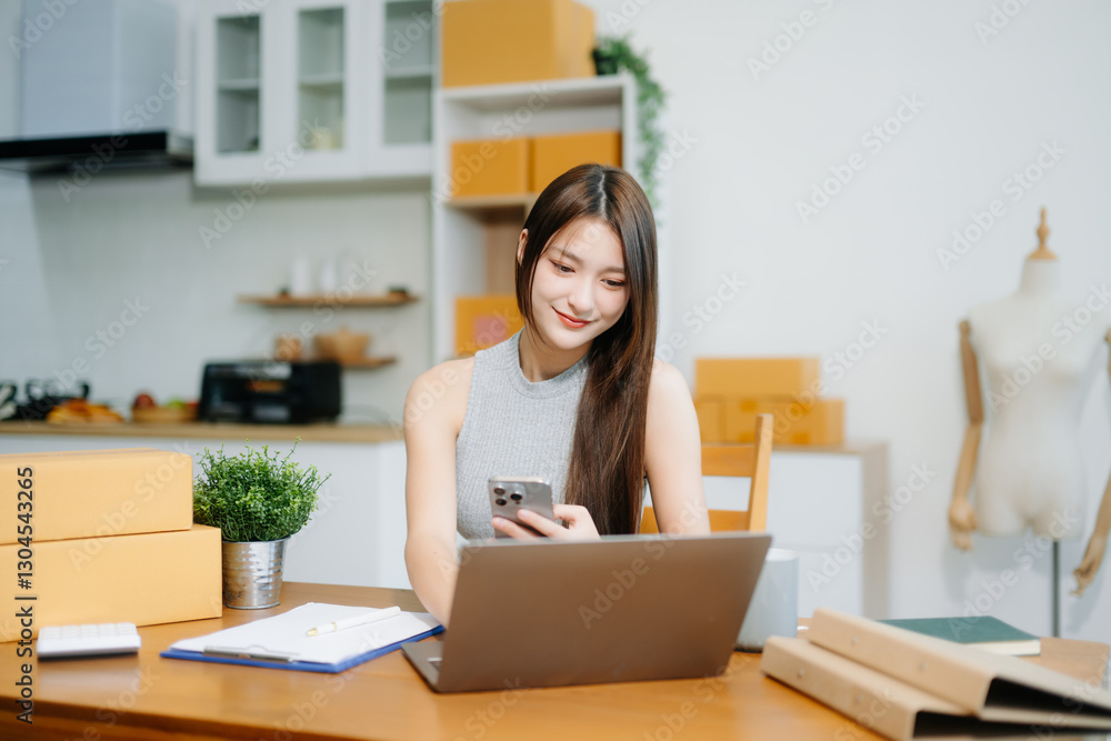 Startup small business SME, Entrepreneur owner woman using smartphone or tablet taking receive Startup small business SME, Entrepreneur owner woman using smartphone or tablet taking receive