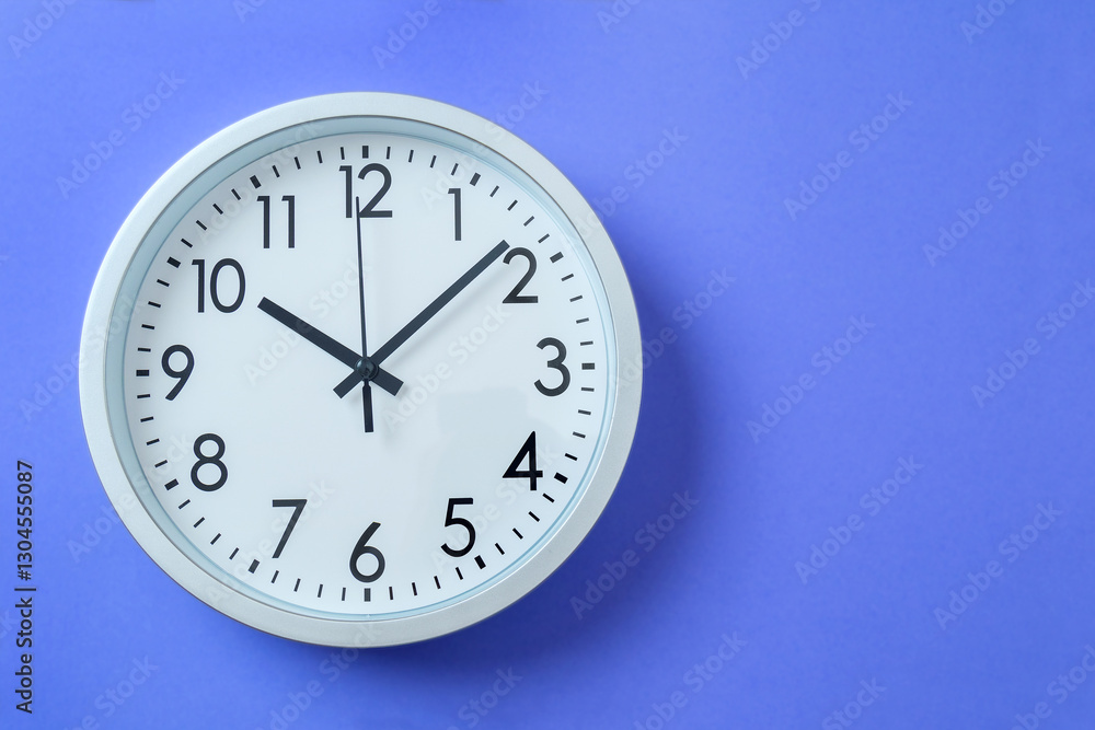 Horizontal banner round clock shows time 10 hours ten minutes. Positive time for work. Clock on blue violet background. Working hours. Horizontal banner round clock shows time 10 hours ten minutes. Positive time for work. Clock on blue violet background. Working hours.