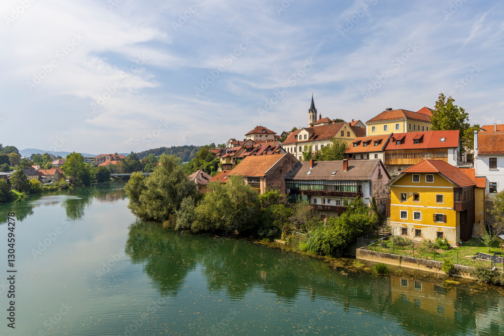 Naklejka premium Scenic view of picturesque village Novo mesto along Krka river in Dolenjska region in Slovenia