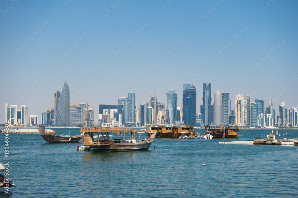 Traditional Dhows and Modern Skyline of Doha, Qatar – Waterfront Cityscape Traditional Dhows and Modern Skyline of Doha, Qatar – Waterfront Cityscape