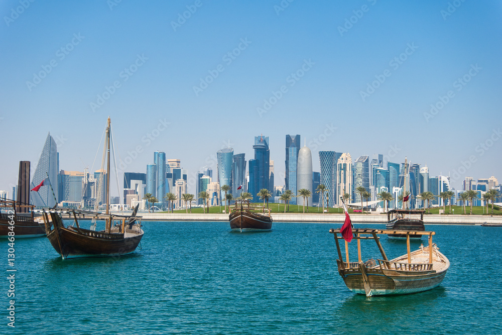 Panoramic View of Doha, Qatar – Skyscrapers and Dhows on the Arabian Gulf Panoramic View of Doha, Qatar – Skyscrapers and Dhows on the Arabian Gulf