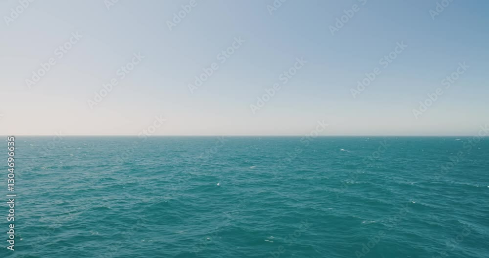 Wide floating ocean view from a moving ship, port side. For projects requiring longer clips in higher resolution, visit StockPlates. Wide floating ocean view from a moving ship, port side. For projects requiring longer clips in higher resolution, visit StockPlates.